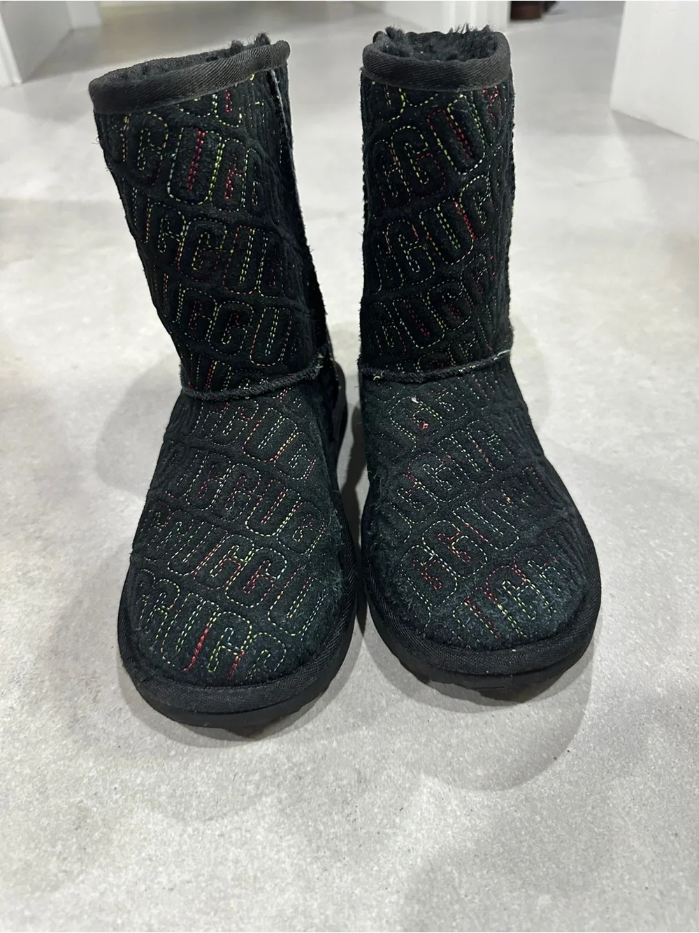 UGG Black Quilted Logo Winter Boots with Subtle Multicolor Stitching